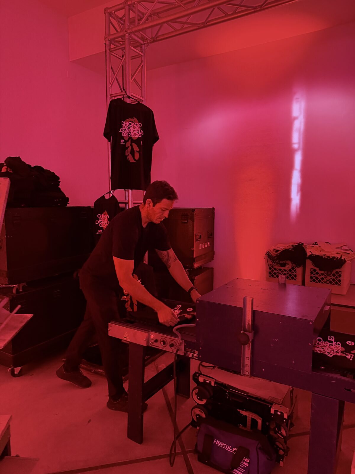 Merch Troop live printing — fresh prints off the platen